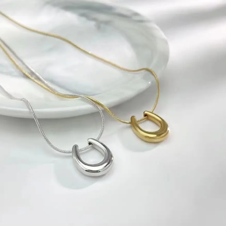2024 bijoux fins 18K or argent plaqué acier inoxydable serpent os chaîne en forme de U pendentif colliers accessoires femmes