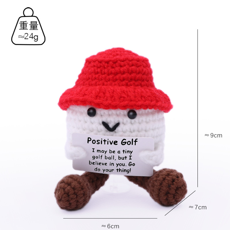 Gorra roja con piernas y pelota de golf.