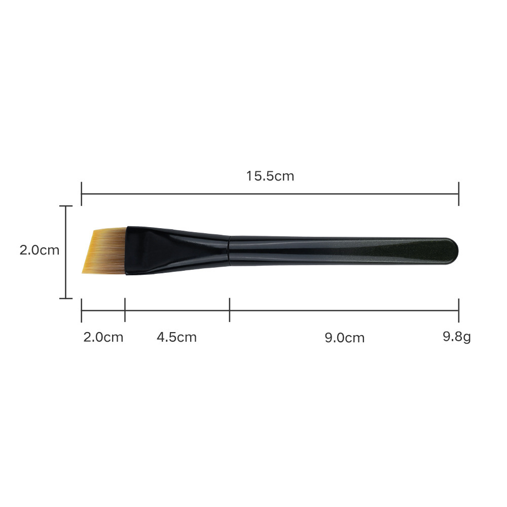 Brocha para base de maquillaje estilo "blade" con cerdas marrones.
