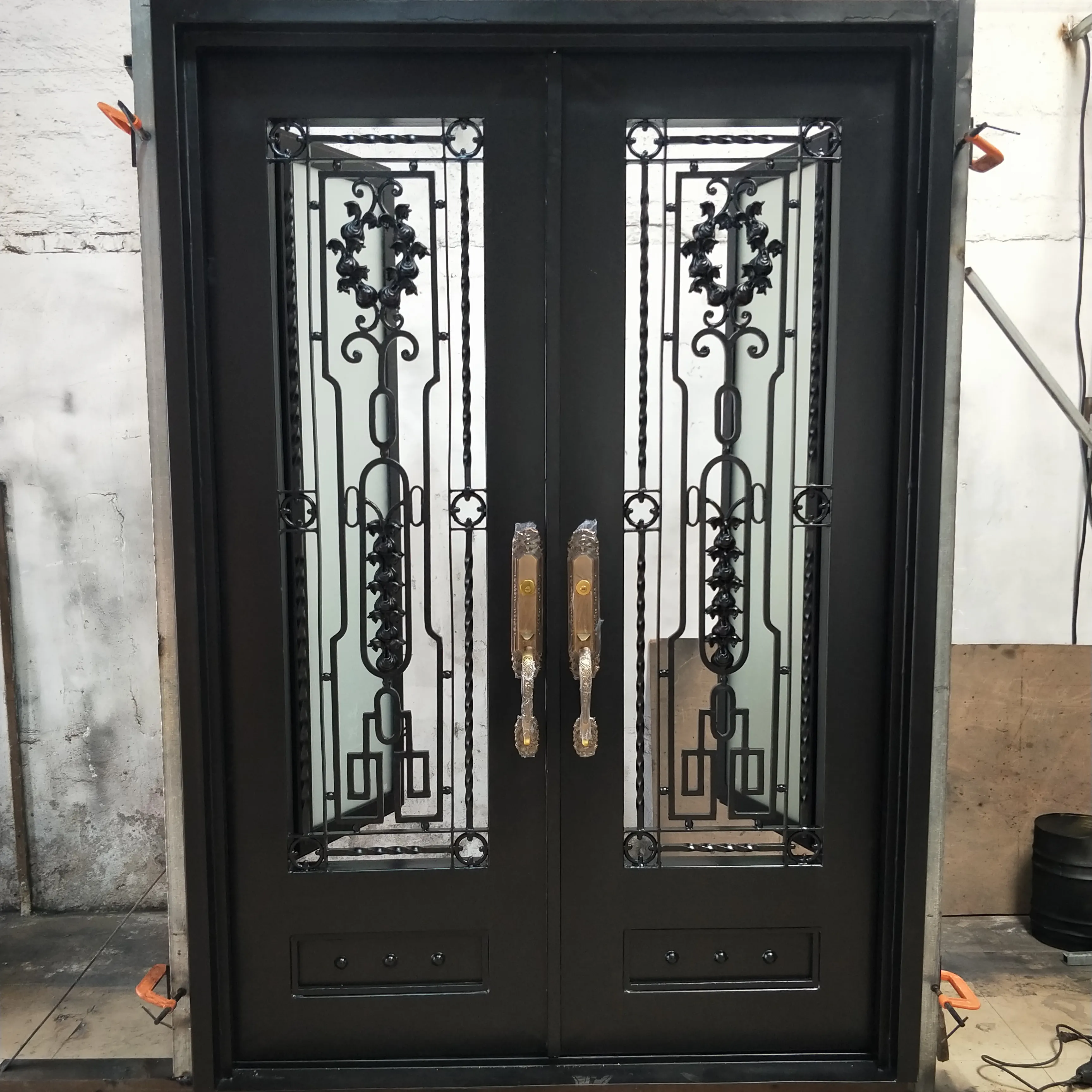 Porte d'ingresso in vetro di ferro/asta di ferro per porta anteriore/porte anteriori in ferro battuto e legno