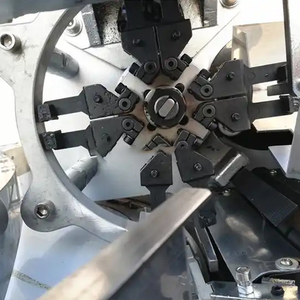 Hocheffiziente vollautomatische Edelstahl 304-Schokolade-Zubehörmaschine für Tisch Doppeldrehung Wickeln PE CPP-Verpackungsmaschine - Product Image 4
