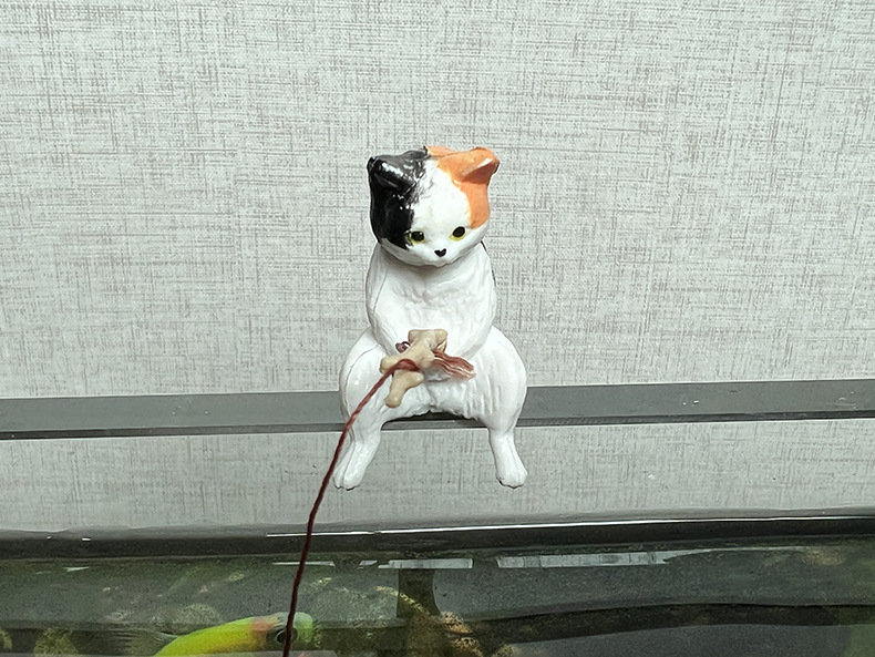 Gatto da pesca dipinto