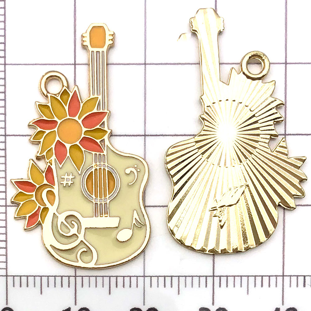 Un violoncelle jaune pâle, saupoudré d'huile - 2,4g - 35*24mm - 21168