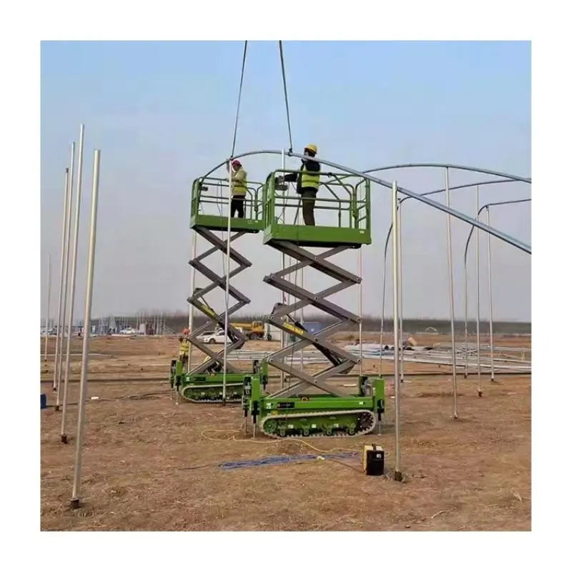 300kg 6M-14m Elevador de tijera sobre orugas hidráulico Plataforma elevadora de tijera móvil eléctrica para construcción de edificios