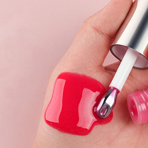 ลิปกลอสสีชมพูสดใส หัวแปรงโลหะขนาดใหญ่ ผลิตจากโลหะผสมสังกะสี แบบปั๊ม ให้ความชุ่มชื้น รับผลิตแบรนด์ส่วนตัว - Product Image 1