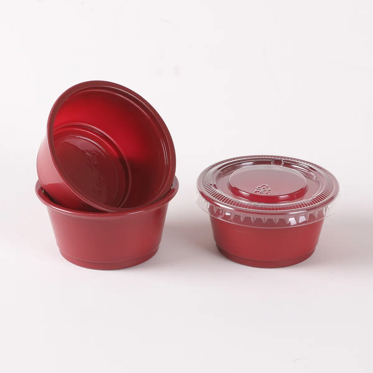 Venta caliente Condimento Pudín Contenedores de plástico Taza de porción desechable roja Tazas de salsa resistentes a fugas