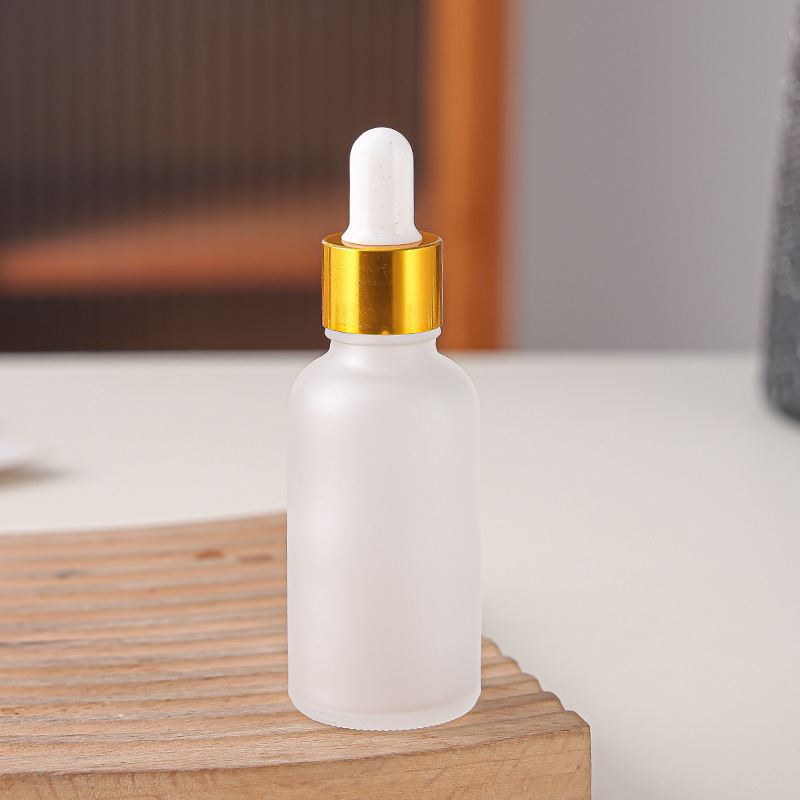 Gold ring + White rubber tip dropper
