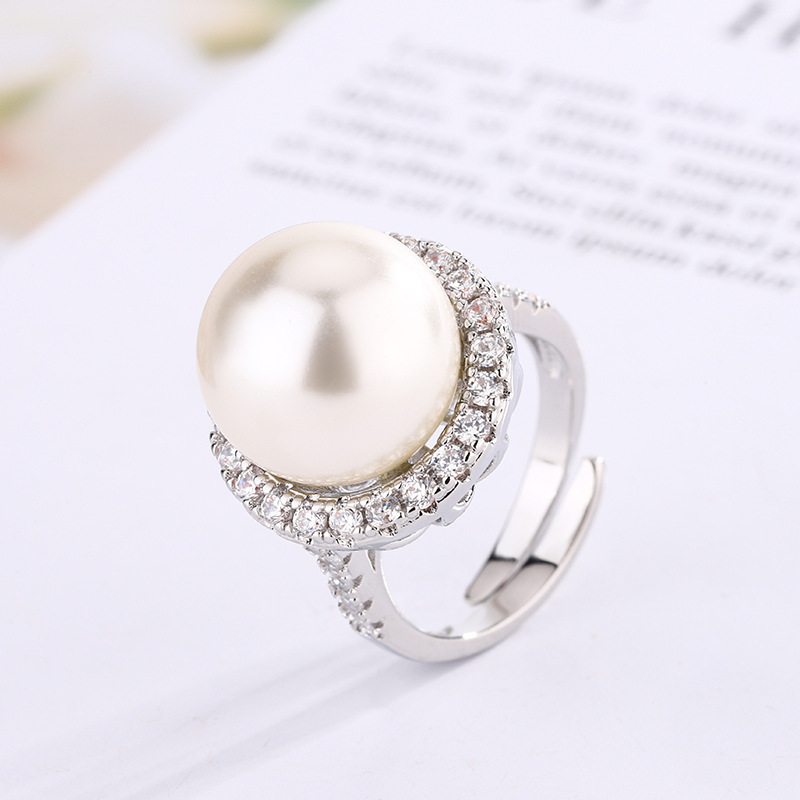 Bague en platine avec perle blanche, taille ajustable