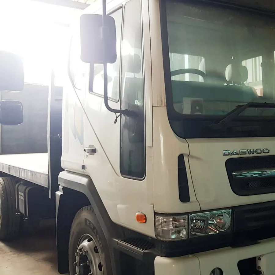 Daewoo-camión de carga sin utilizar con mango derecho, 18 toneladas con bandeja de cama plana, 4x2, camiones de carga F3CBF