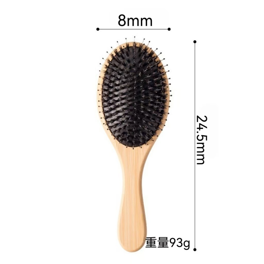 Large size oval bamboo brush with boar bristle cushioning.