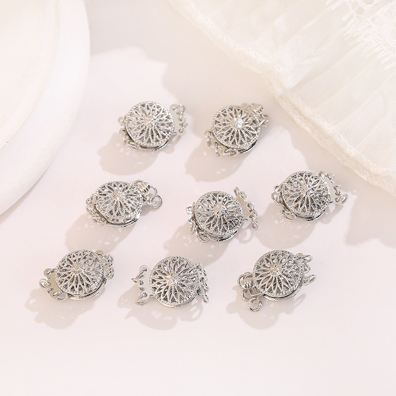 4. White gold round hollowed-out sunflower clasp, 12mm in diameter.