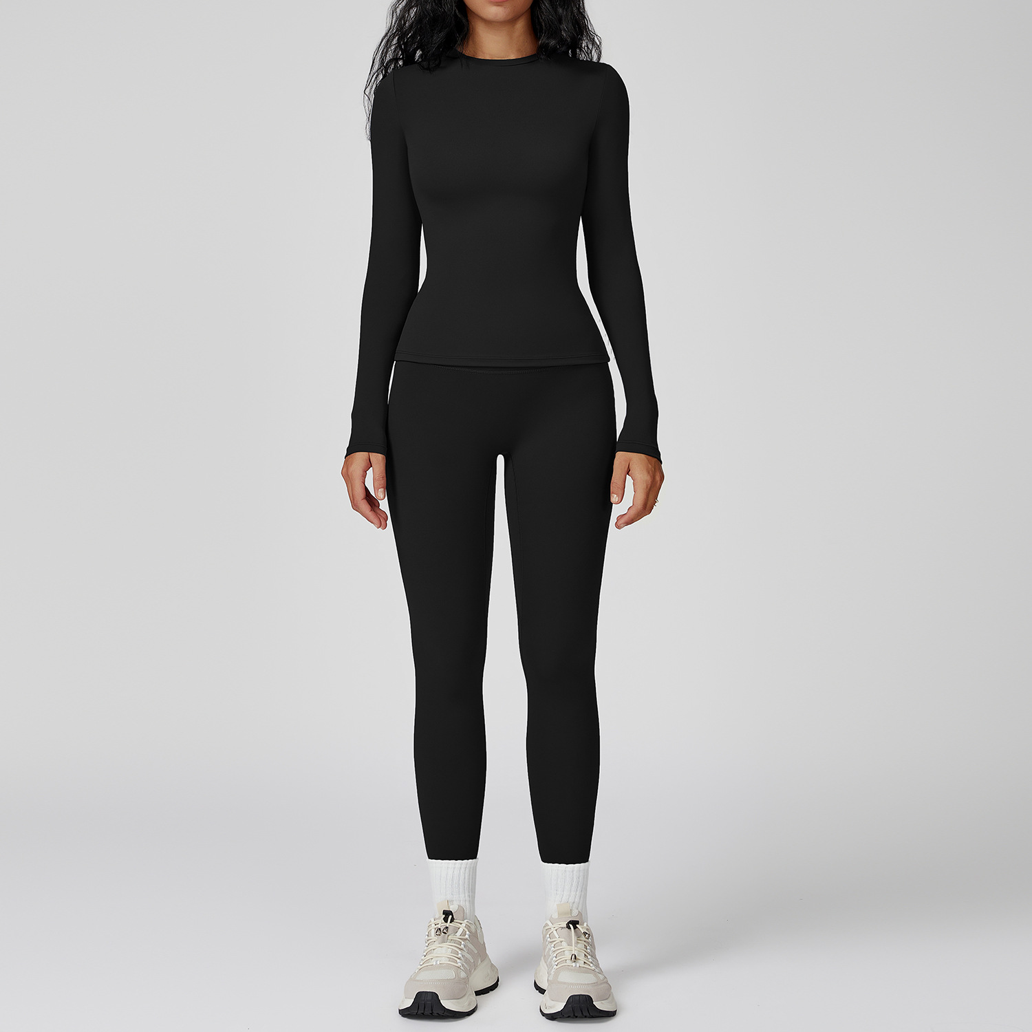 Completi leggings e top a maniche lunghe neri