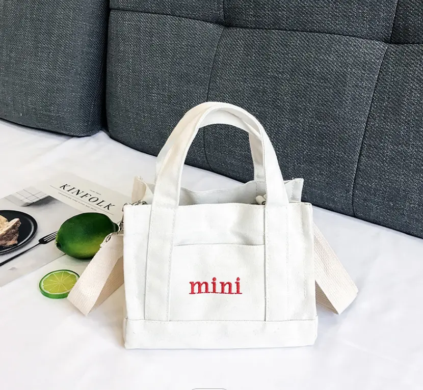Butik pamuk plaj tuval alışveriş moda hediye tuval Tote logoları ile boş özel beyaz pamuk kanvas çanta tedarikçisi