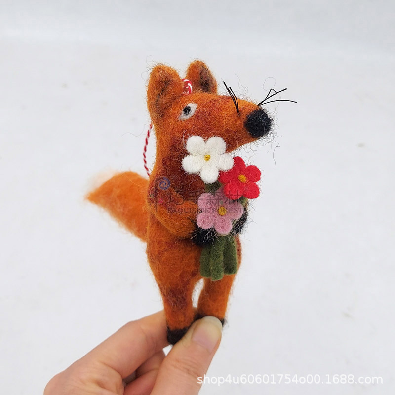 Fox holding three-color flower