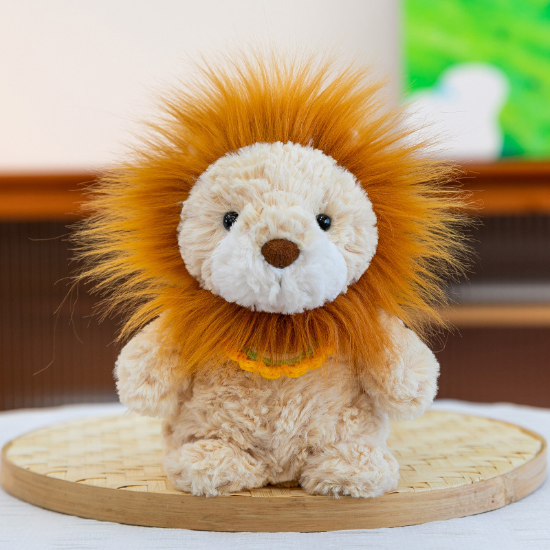 Lion bouclé et doux avec bavoir