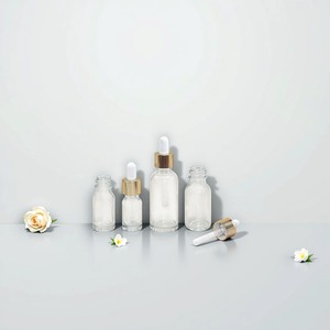Para Venda Clear Flat 5ml <span class=keywords><strong>10ml</strong></span> 15ml 20ml 30ml 50ml 100ml Vazio Redondo Cilindro Garrafa Conta-gotas De Vidro Garrafa De Óleo Essencial