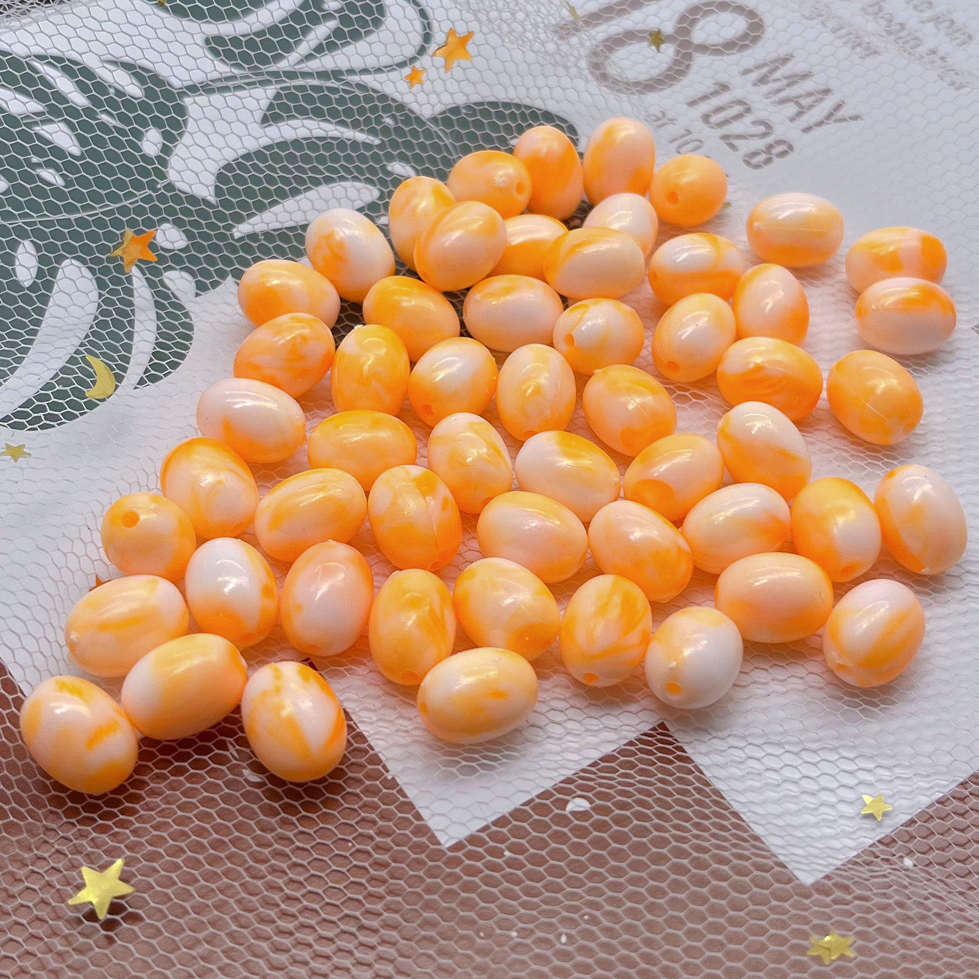 Perles ovales bicolores macaron, orange