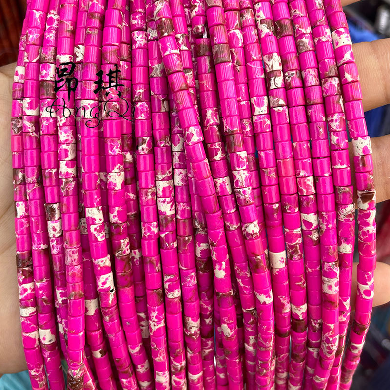 Pin empereur rouge rose synthétique