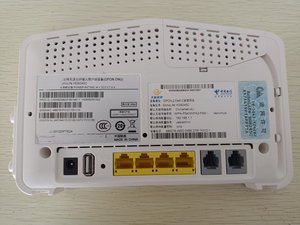 ONT英語ファームウェア光ファイバー機器1GE + 2FE ++ 1CATV + 2TEL + 1USB FTTH HG8245C EPON 99% 新しいルーター4Gネットワーク
