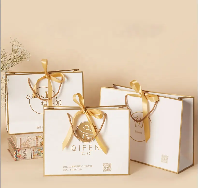 Precio de fábrica personalizado Venta caliente nuevo estilo de papel de comestibles caja de regalo bolsa de compras joyería bolsa de papel de regalo de lujo