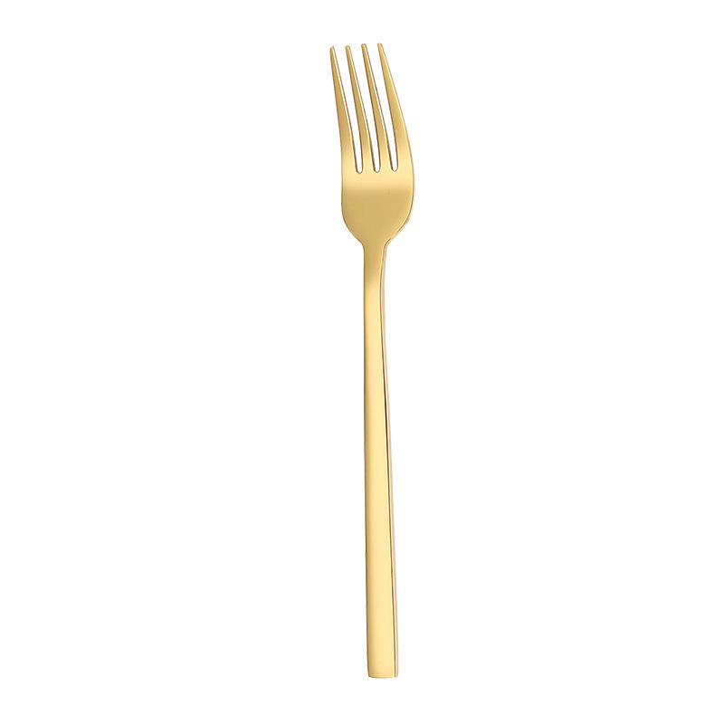 Tenedor de mesa dorado