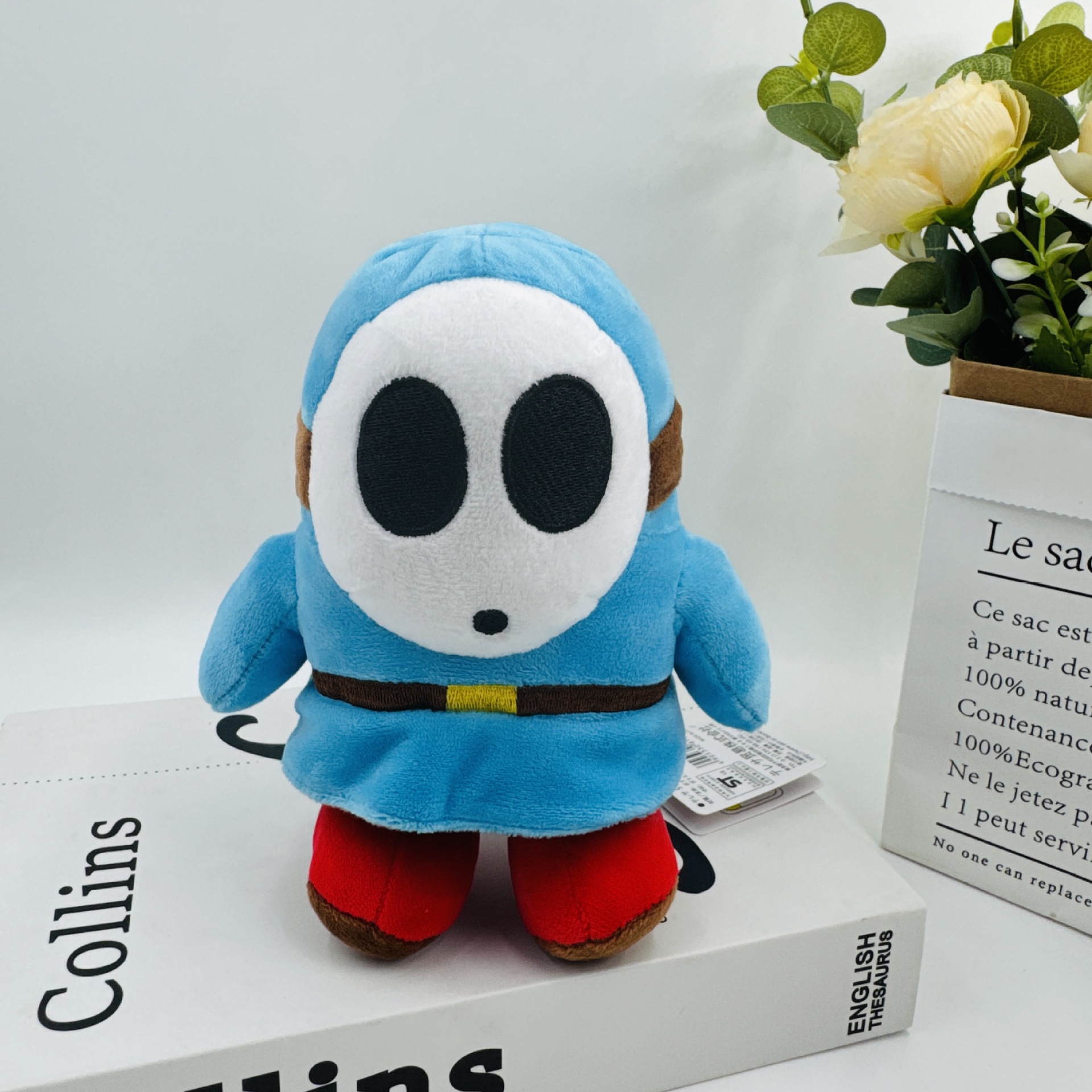 Une petite figurine masquée en trompette-bleu clair-15cm