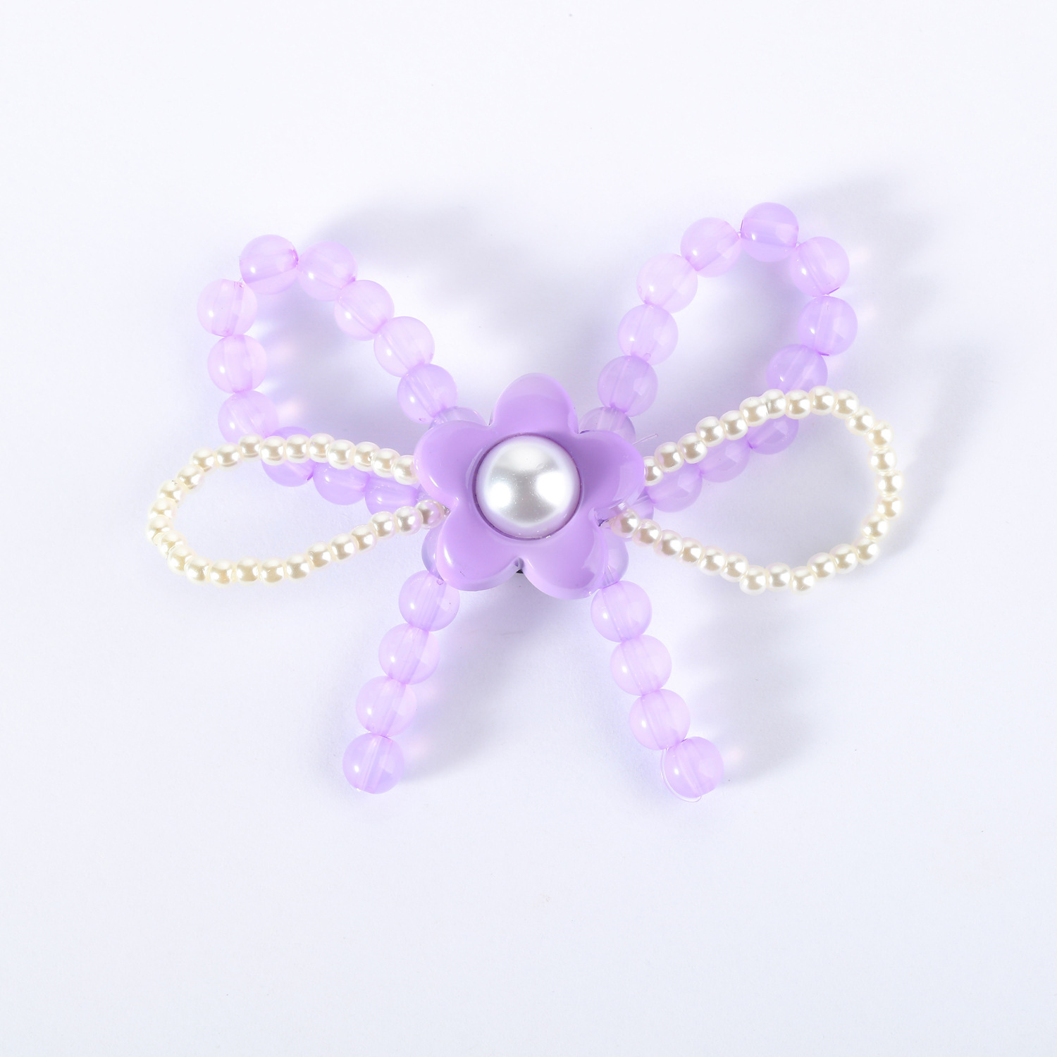 Noeud de perles violettes