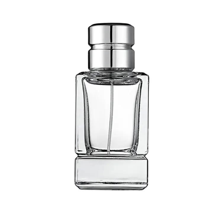 Yeni tasarım OEM kare 50ml lüks şeffaf püskürtücü Atomizer boş şeffaf cam parfüm şişesi üreticisi