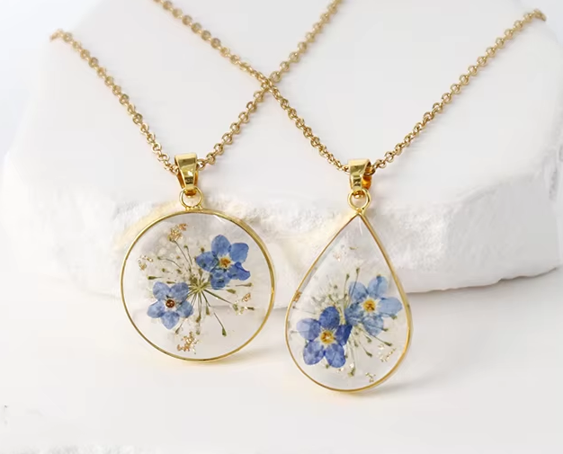 Fleur bleue dorée à 2 gouttes