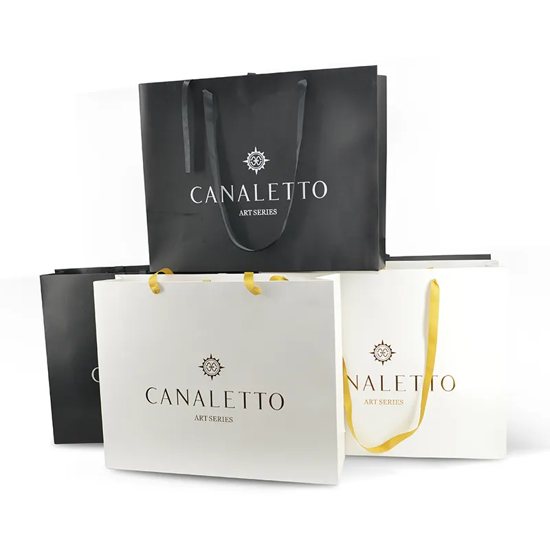 Bolsa de papel Kraft blanca para compras, bolsa de regalo de Perfume cosmético con mango de lujo, logotipo personalizado impreso, bolsa de papel para ropa