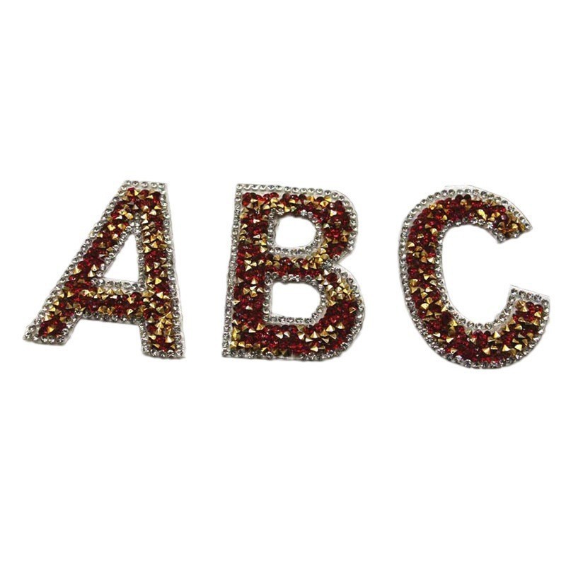 Set da 26 lettere oro e rosso