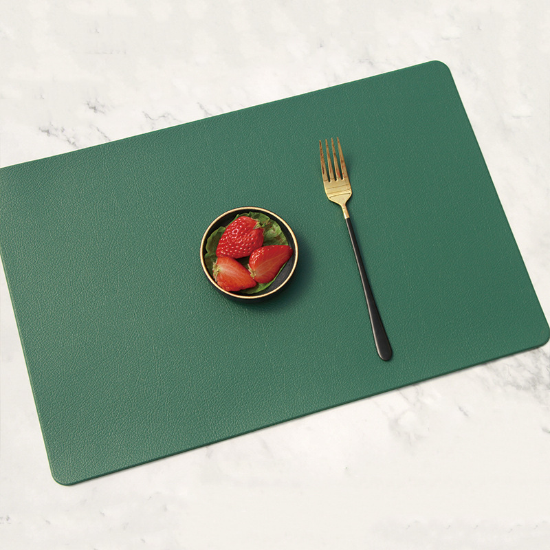 Rectangle en simili cuir vert avec bord pressé