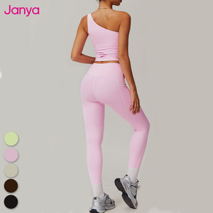 Janya sıcak satış spor takımları spor ev <span class=keywords><strong>Yoga</strong></span> setleri bir omuz çıkarılabilir pedleri sutyen ve hiçbir ön dikiş yan cepler <span class=keywords><strong>Yoga</strong></span> tayt Set