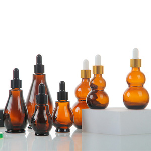 เครื่องสําอางหรูหรา 10 ml 20 ml 30 ml 50 ml 100 ml ขวดปิเปตรูปมะระ 30 ml ขวดหยดแก้วอําพันสําหรับน้ํามันหอมระเหย - Product Image 1