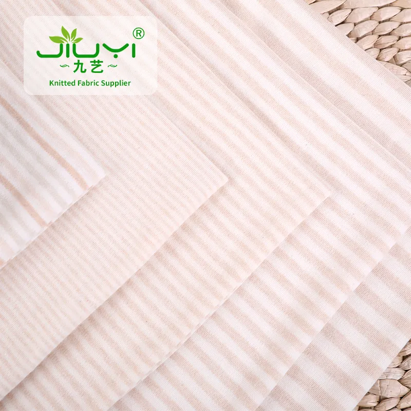 La fabbrica ha certificato la banda naturale ha colorato il tessuto puro del cotone 100% per l'abbigliamento del bambino