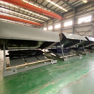 Herramientas de carga y descarga de almacén Suministro del fabricante Niveladores de muelle hidráulicos fijos para una logística de almacén rápida