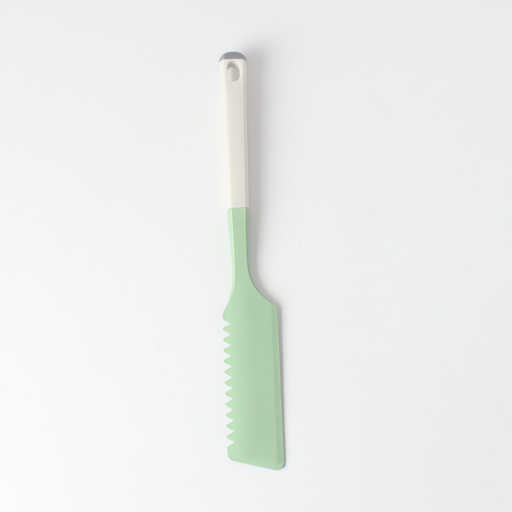 Grattoir en silicone vert