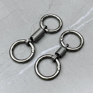 אנטי-טי לאבד מלאכות מפתחות מסתובבת עם 2 טבעות נתיק אביזרים לנשים