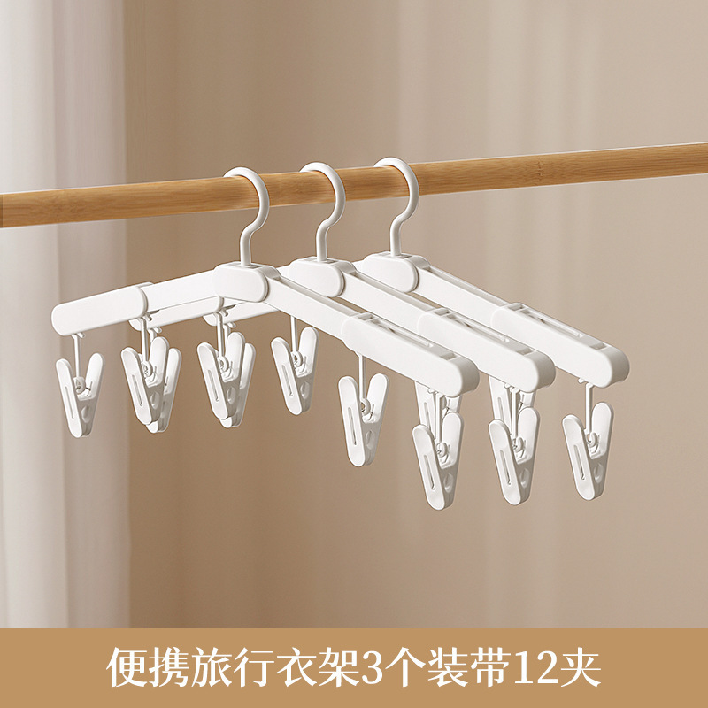 3 clothes hangers with 12 clips