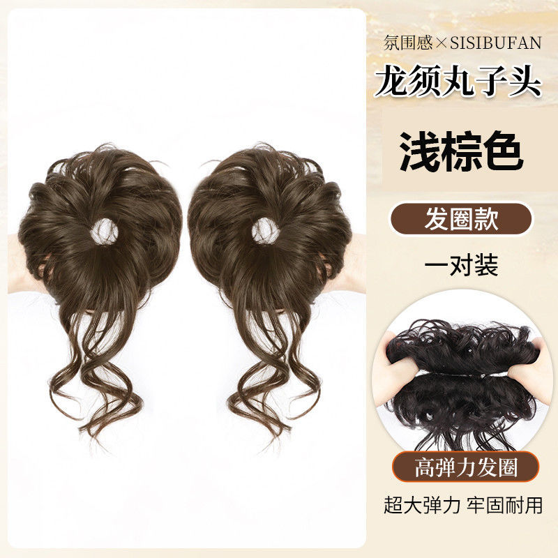 Trendy hairstyle - two light brown buns