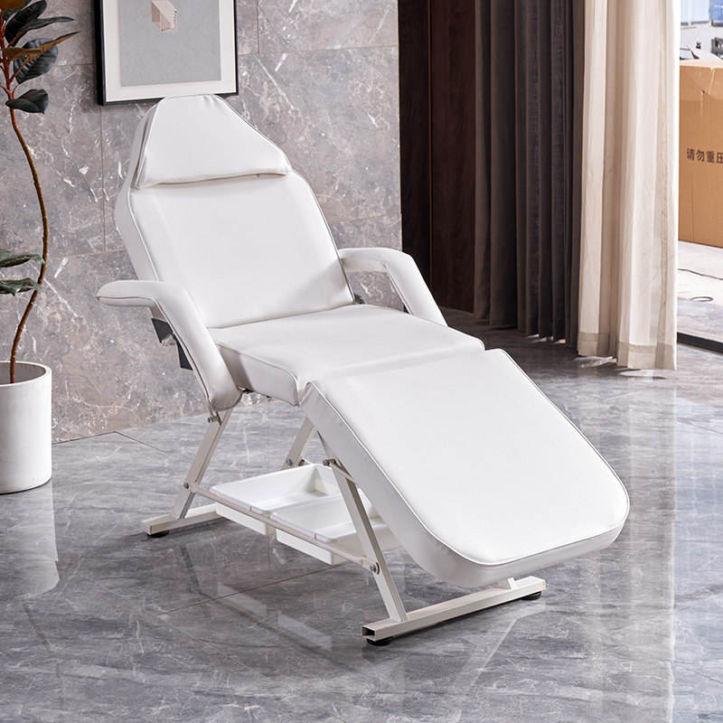 Lit de broderie de tatouage blanc avec accoudoir-ordinaire