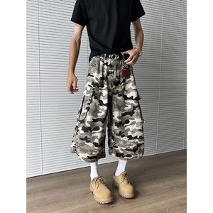 男性と女性のためのアメリカのレトロなマルチポケットプリーツカモフラージュカプリパンツ、新しい夏の流行ブランドルースワイド脚ワークパンツ