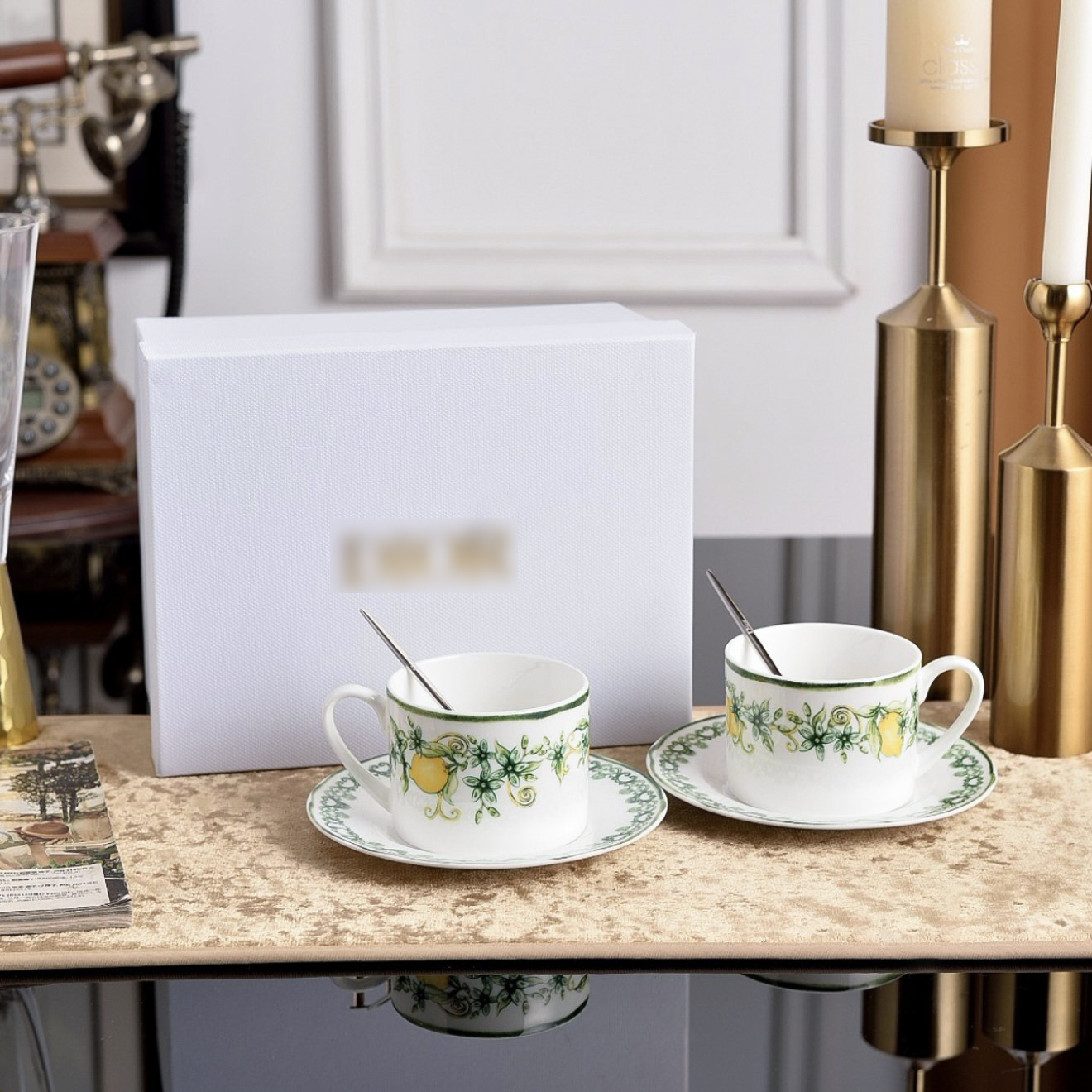 2 cups 2 saucers with spoon