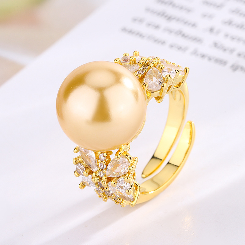 Bague ouverte dorée avec billes dorées