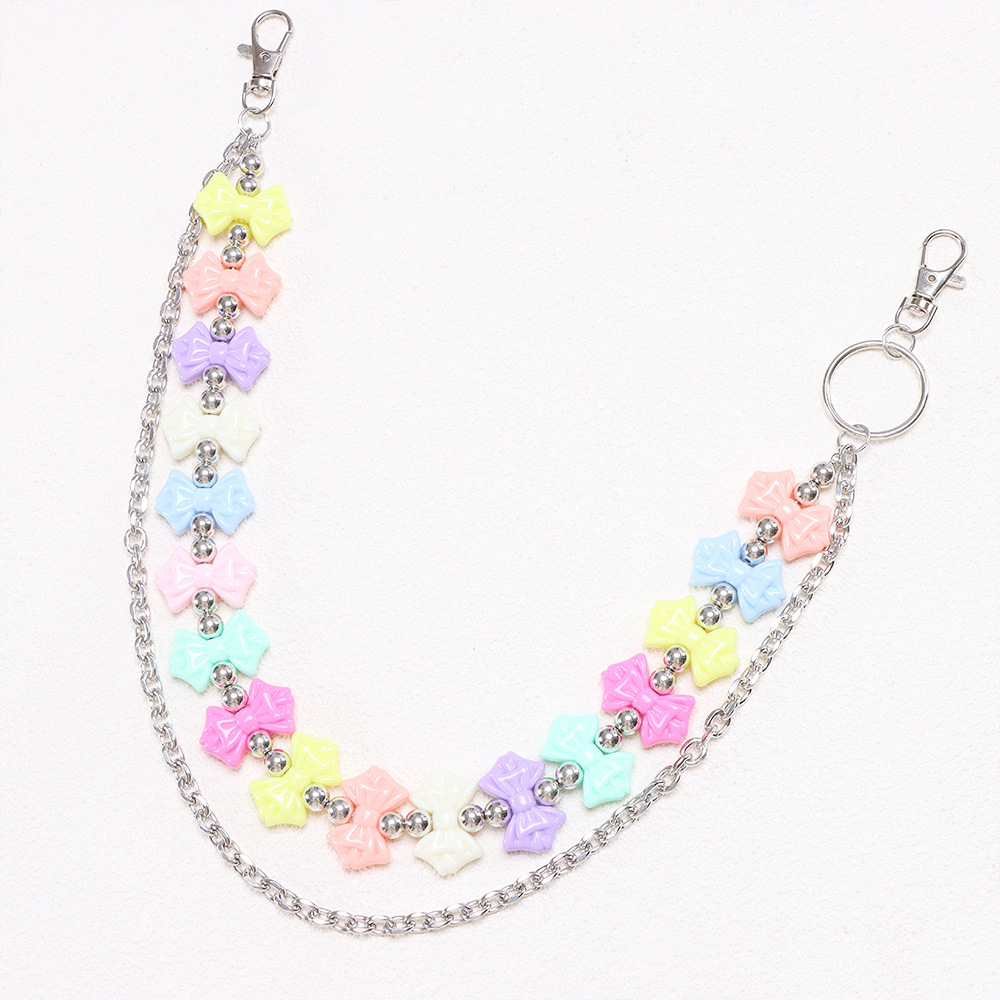 Double-layered trouser chain with bow