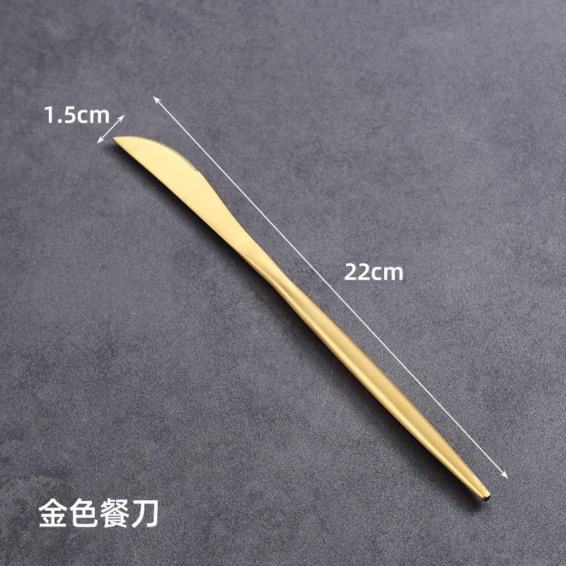 Gold-colored dinner knife