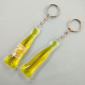 瓶形软聚氯乙烯钥匙扣，内部印有液体定制标志 - Product Image 3