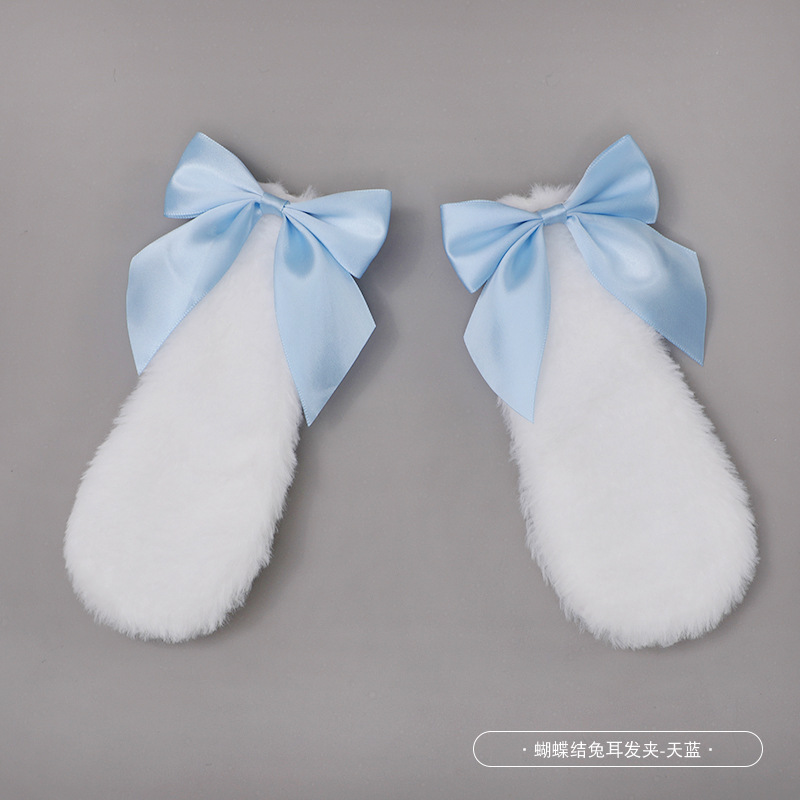 white rabbit ears sky blue bow