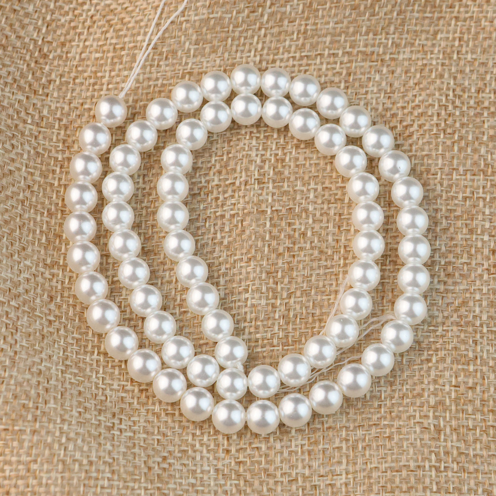 Blanc nacré 8 mm, environ 49 perles par brin