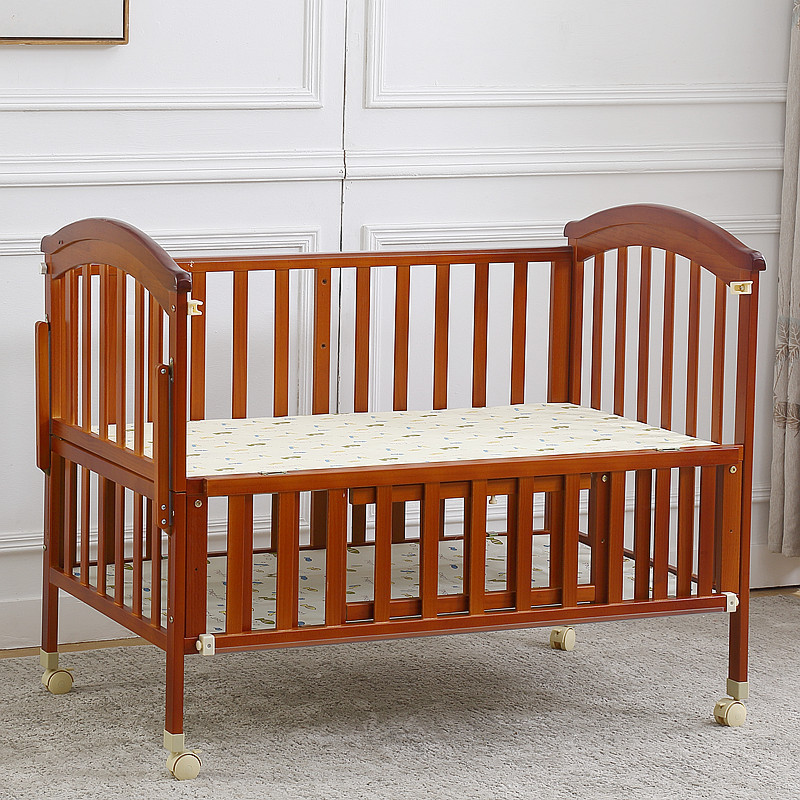 Lit de bébé couleur bois pêche (lit nu)
